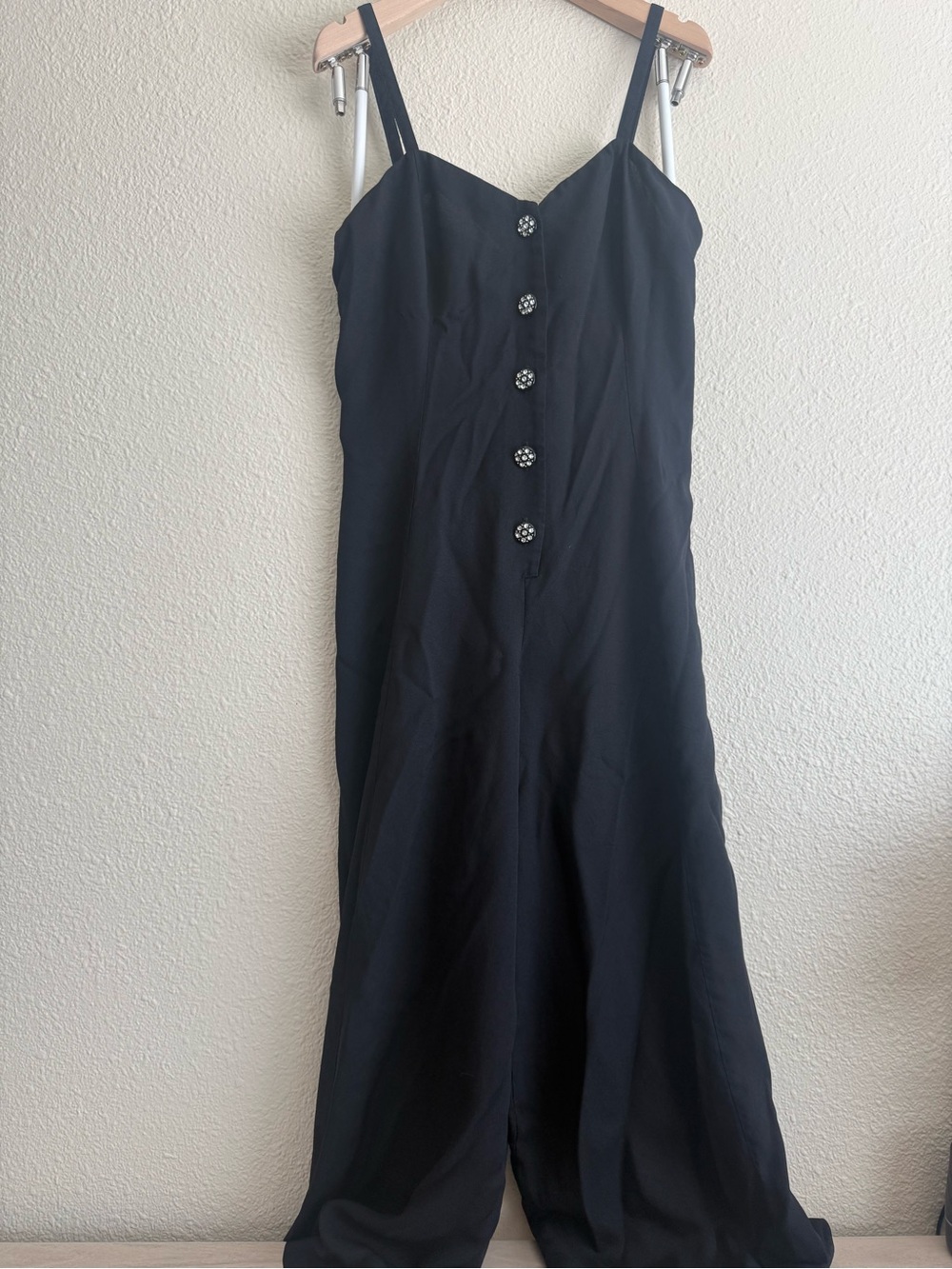 Black Spaghetti-Strap Jumpsuit with Decorative Buttons